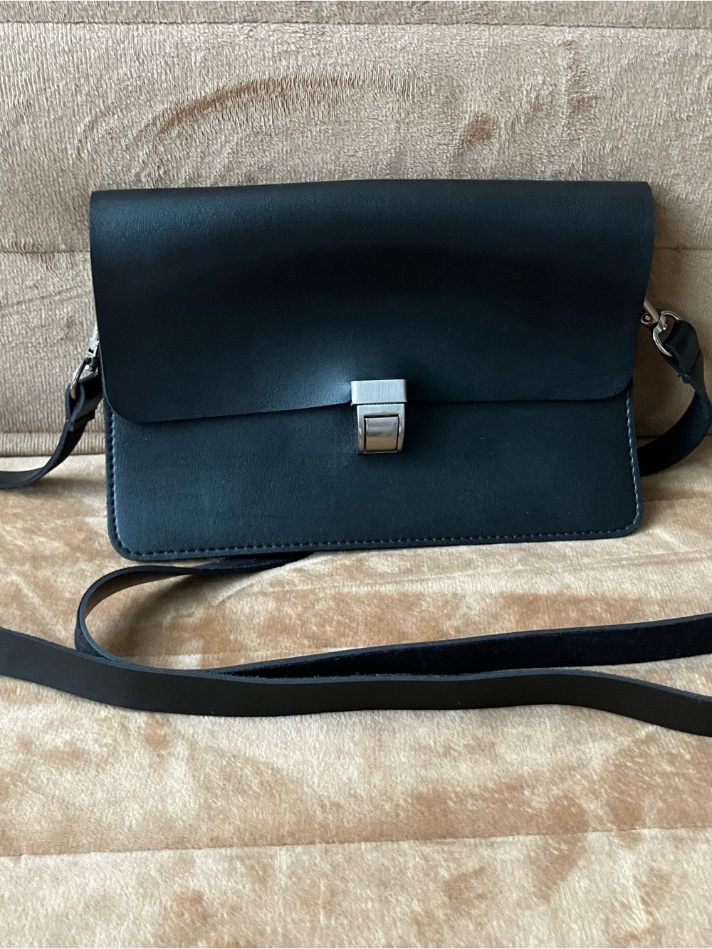 Minimalist Black Leather Crossbody Bag with Silver Clasp